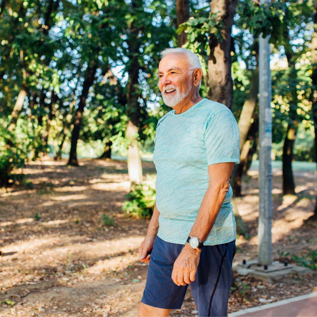 guy smiling while walking